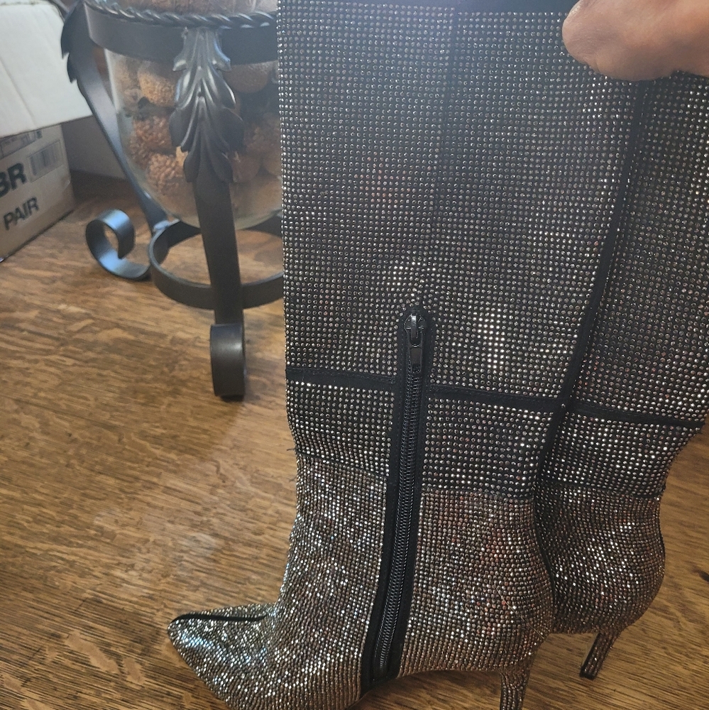 Pair of Inc boots